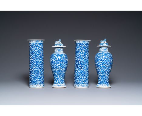 Full title: A Chinese blue and white four-piece garniture, Kangxi mark, 19th C.Description:H.: 32 cmThe absence of a conditio