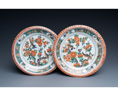 Full title: A pair of Chinese famille verte 'magpies and grasshopper' dishes, KangxiDescription:Dia.: 27 cmThe absence of a c
