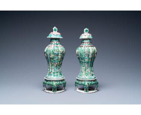 Full title: A pair of Chinese verte biscuit vases and covers on stands, KangxiDescription:H.: 26 cm (total height) H.: 21,5 c