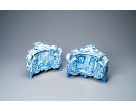 Full title: A pair of rare Dutch Delft blue and white candlestick bases, late 17th C.Description:L.: 24,5 cm - H.: 20 cmÊ ÊÊE