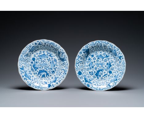 Full title: A pair of Chinese lobed blue and white 'fish' dishes, KangxiDescription:Dia.: 27,5 cmThe absence of a condition r