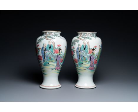Full title: A pair of Chinese famille rose vases, Kangxi mark, RepublicDescription:H.: 34,5 cmThe absence of a condition repo