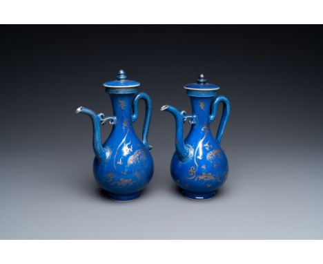 Full title: A pair of Chinese gilt-decorated powder blue-ground 'qilin' ewers and covers, KangxiDescription:H.: 20,5 cm - L.: