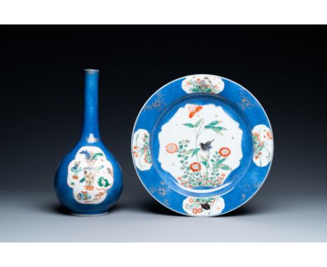 Full title: A Chinese famille verte powder blue vase and a dish, KangxiDescription:H.: 28 cm (the vase)Dia.: 27,5 cm (the dis