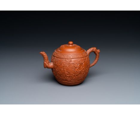 Full title: A Chinese Yixing stoneware teapot with boys among peony scrolls, KangxiDescription:L.: 16,5 cm - H.: 10 cmÊ Condi