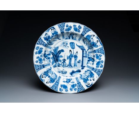 Full title: A Chinese blue and white dish with two ladies and two rabbits in a garden, Kangxi mark and of the periodDescripti