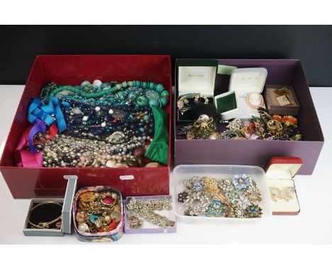 A collection of vintage and contemporary costume jewellery to include an amethyst 9ct gold bangle and an indistinctly stamped