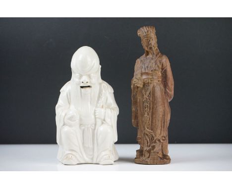 Chinese Blanc de Chine Ceramic Figure of a Seated Elder, 18cm high together with Hardwood Carved Chinese Figure, 21cm high 
