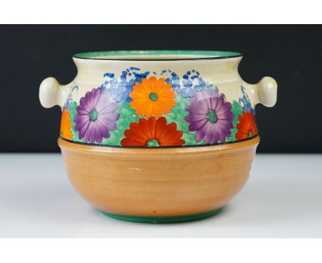 Clarice Cliff Pottery Biscuit Barrel in the Gayday pattern (lacking lid and handle), 12cm high 