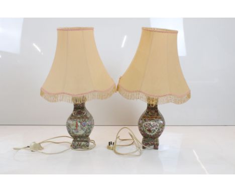 Pair of Chinese Famille Rose Ceramic Table Lamps decorated with figures, flowers, butterflies and birds, 40cm high to top of 