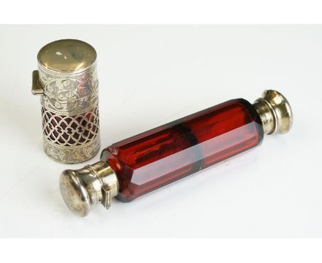 A victorian Ruby glass double ended scent bottle together with another ruby glass scent bottle housed within a fully hallmark