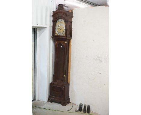 George III Mahogany Longcase Clock, three winding holes, the arched face with moon-phase, brass dial with silver chapter ring