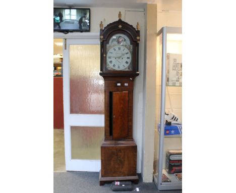 19th century Mahogany 8 day Longcase Clock, the arched hood with moon-phase, painted dial with Roman numerals, seconds dial a