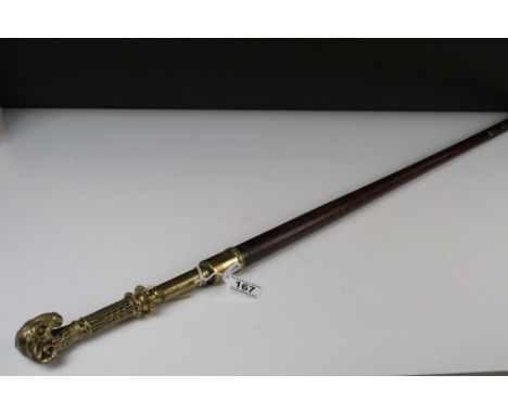 Walking Stick with Heavy Brass Handle and Upper Shaft in the form of a Rams Head, 90cm long 