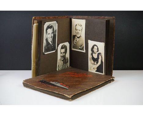 Two vintage scrap books complete with a large quantity of signed actor and actress photographs and postcards. 