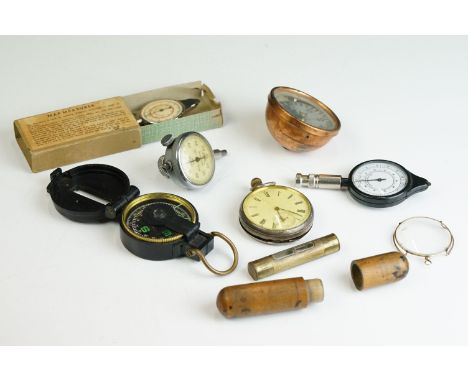 A group of mixed collectables to include a map measure, directional compass, silver cased pocket watch spirit level....etc. 