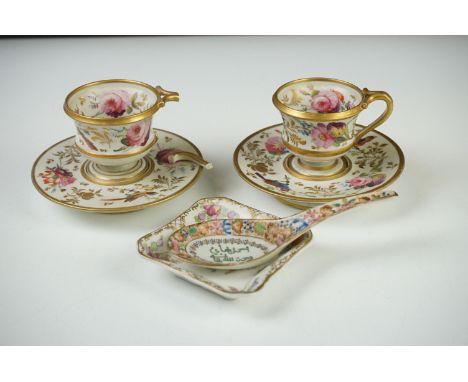 Pair of Continental Porcelain Cabinet Cups and Saucers decorated in gilt and enamels with flowers and birds, some damage, cup