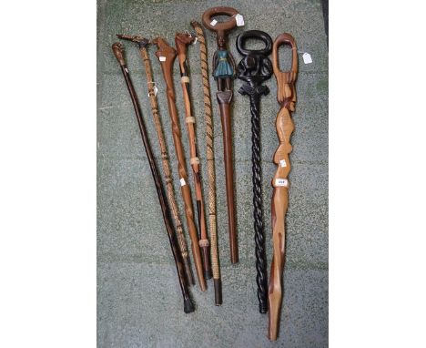 Walking Sticks - an African tribal style stick; others similar carved with figures and animals, etc (8) 