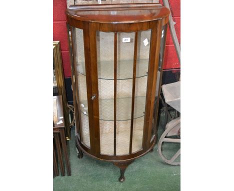 A 1930's walnut single door China display cabinet 