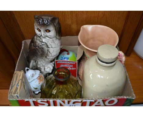 A Lyvia novelty campers lantern as a world globe; an Arthur Woods floral jug c1930's; a stoneware bed warmer; a model of an o
