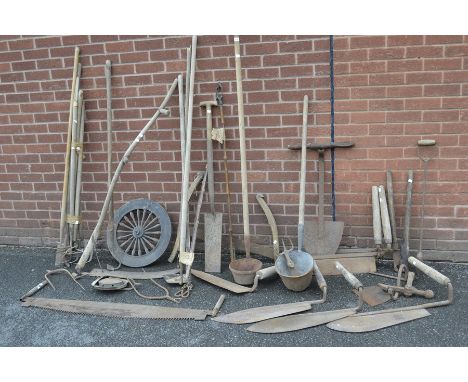 Vintage agricultural tools including peat spade; drag rake; scythe; post spade; hay knives; ditching ladles; hoes; cross cut 