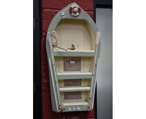 A decorative shelf unit as a boat