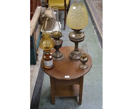 A late Victorian brass oil lamp, with glass shade; other lamps and shades; quantity; a mid-20th century oak work box