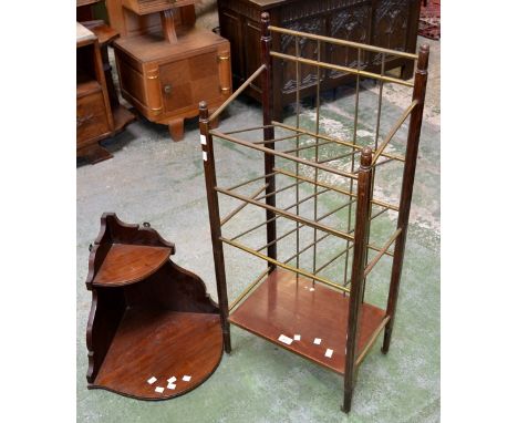 An Edwardian mahogany and brass music stand, circa 1910; an Edwardian mahogany two tier corner shelf. (2)