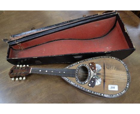 An early 20th century Filli Ferrari and Co. bowl back Neapolitan mandolin, inlaid with mother of pearl, tortoiseshell and aba