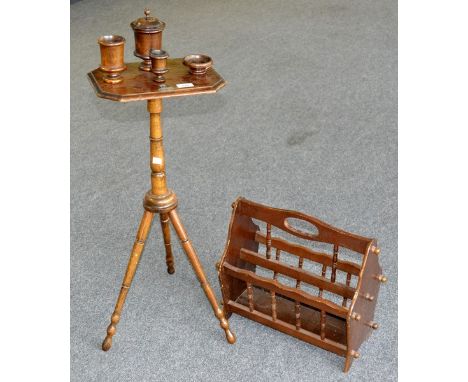 An unusual smokers stand with four urnular cups on a canted rectangular top, turned column, round sockle, tapering turned tri