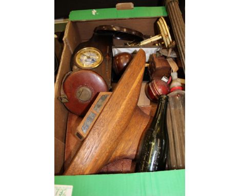 A mixed collection of items to include: Early 20th Century Mantle Clock, Teak Home Made Pond Yacht, Leather Tape Measure etc 
