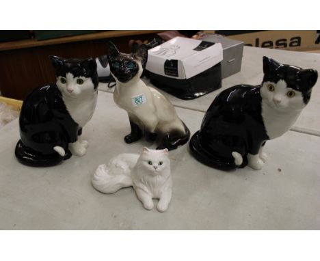 A group of Pottery Cats including: damaged Winstanley item, Just Cats &amp; Co items etc (4) 
