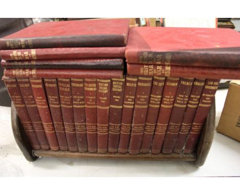 A collection of Vintage Hard Back Books in stand: 