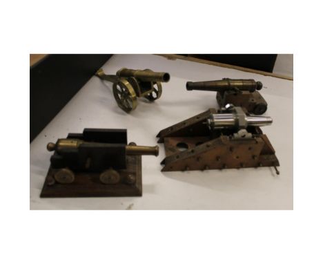 A collection of Brass, Bronze &amp; Similar Ornamental Cannons: length of largest 20cm(4) 