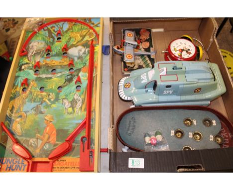 A mixed collection of items to include: Tinplate toys, Sooty Xylophone, SPV Vehicle, Mickey Mouse Alarm clock etc 