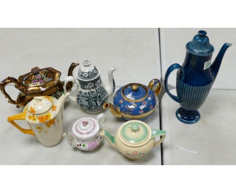 A collection of Floral Decorated Teapots including Susie Cooper, Hand decorated items, Carltonware etc , tallest 34cm(7) 