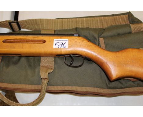 Vintage .22 cal break barrel air rifle: plus soft carry case. 