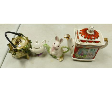 A collection of Novelty Teapots including: Sadlers Romeo &amp; Juliet , Carltonware Miniature Legged item, Khein Ceramic Rabb