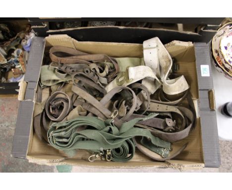 A collection of vintage military and similar leather and canvas belts: 