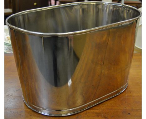 A modern chrome reproduction champagne trough, inscribed with Lily Bollinger quote 'I drink it when I'm happy and when I'm sa