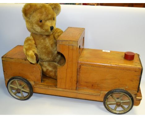 Juvenalia - an early/mid 20th Century scratch built wooden model of a steam engine; an Irish plush teddy bear (2)