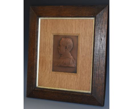 An early 20th century bronze portrait plaque, in relief with Sir William Chandler Roberts-Austen K.C.B., D.C.L., F.R.S (1843 