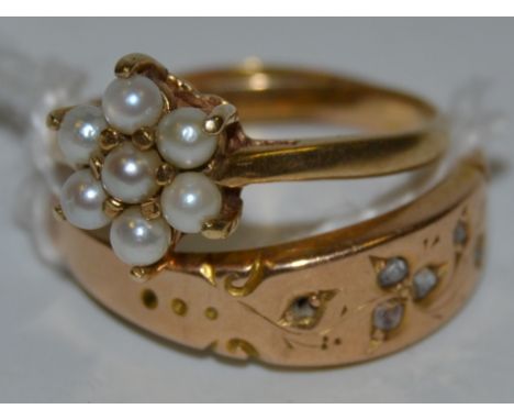 A seed pearl flower cluster ring, 9ct shank, 1g;  a diamond chip ring, 15ct gold shank, 1.8g, 2.8g total