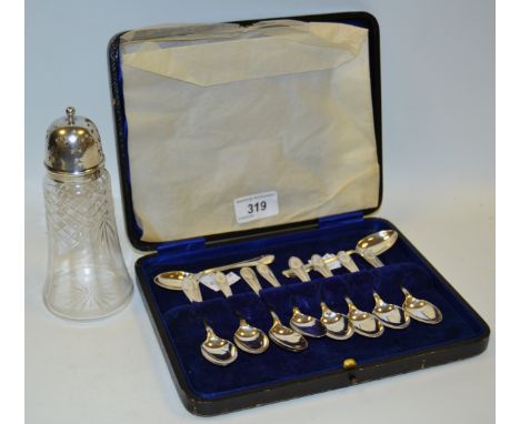 A set of twelve silver coffee spoons, Charles Bradbury, Sheffield; a silver mounted and clear glass caster
