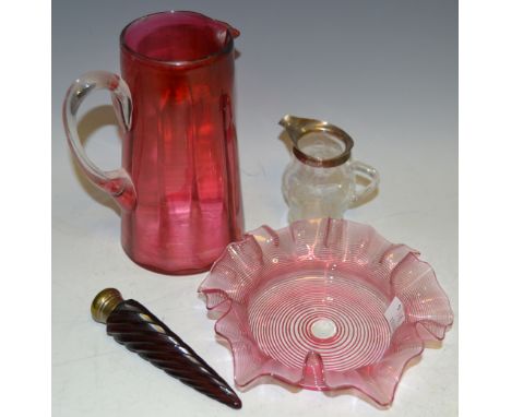 Glass - a Victorian ruby tapering spiralled scent flask;  a silver rimmed cream jug, Birmingham 1907;  cranberry water jug et