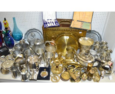 Metalware - a silver plated ice bucket; a brass magazine rack; silver plated goblets; a three piece silver plated stop fluted