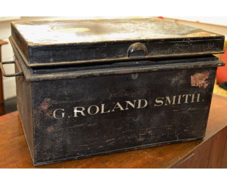 An early 20th century metal bound deeds trunk hand painted with 'G. Roland Smith. ' 