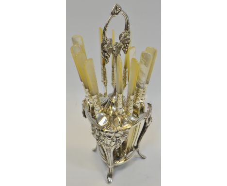 Silver Plated Ware  - a set of 12 mother of pearl hafted fruit knives, a conforming stand applied with fruiting vines c.1910 