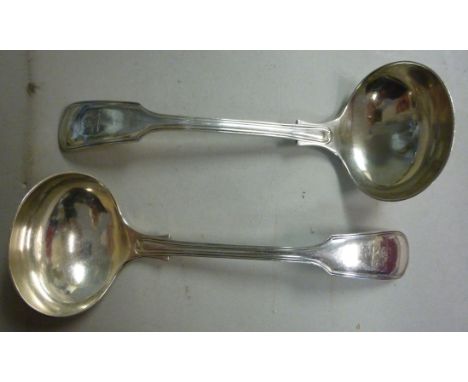 A pair of silver fiddle and thread pattern sauce ladles  William Hutton & Sons  Sheffield 1927