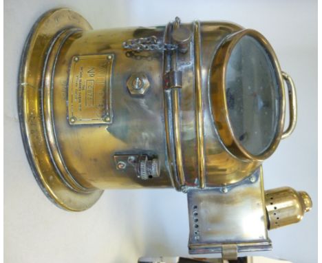 An early 20thC The Ontario Hughes Owen Co Ltd brass cased binnicale compass of drum design, the domed top with a fixed handle